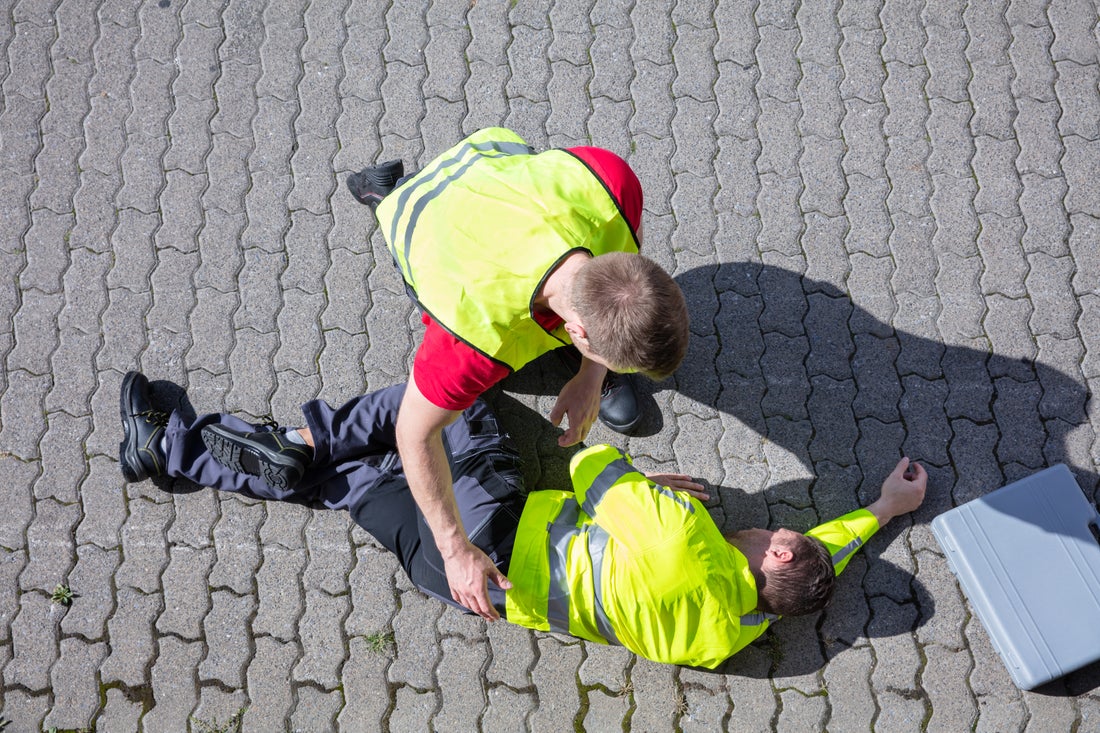 a boy lying on the ground